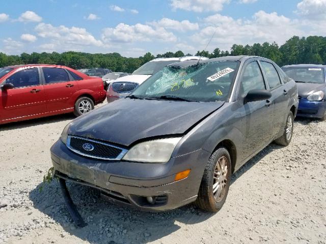 1FAHP34N27W222154 - 2007 FORD FOCUS ZX4 GRAY photo 2