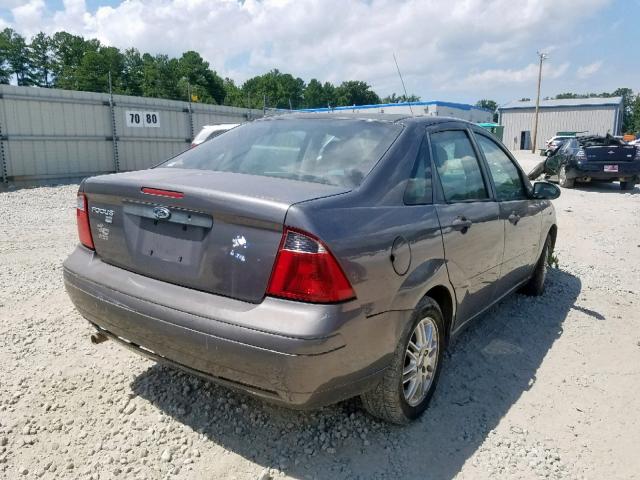 1FAHP34N27W222154 - 2007 FORD FOCUS ZX4 GRAY photo 4