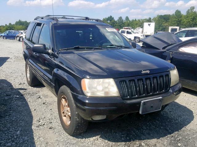 1J4GW58S8YC229501 - 2000 JEEP GRAND CHER BLACK photo 1