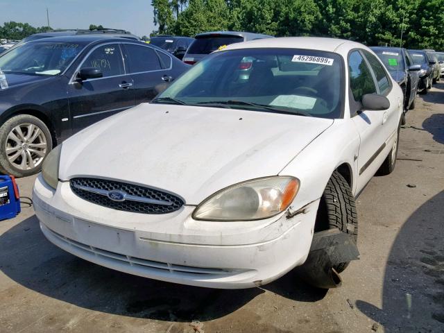 1FAFP522XYA154700 - 2000 FORD TAURUS LX WHITE photo 2