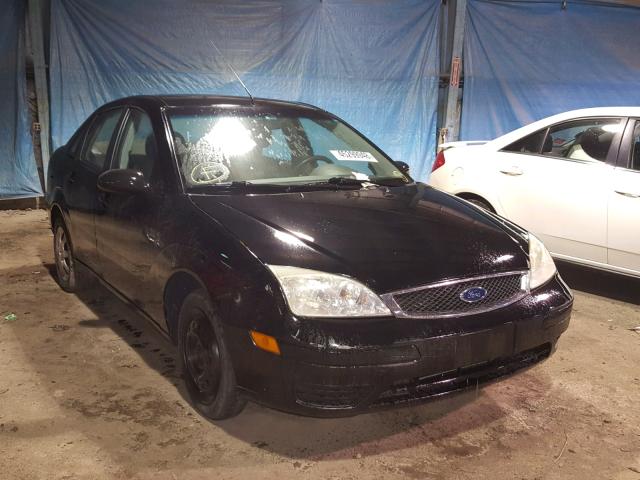 1FAFP34NX5W157770 - 2005 FORD FOCUS ZX4 BLACK photo 1