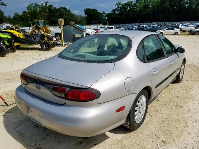 1FAFP52U8XA164223 - 1999 FORD TAURUS LX SILVER photo 4