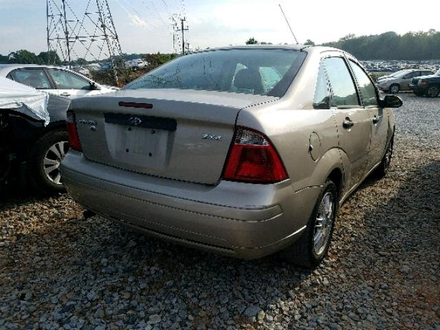 1FAFP34N06W120051 - 2006 FORD FOCUS ZX4 BEIGE photo 4