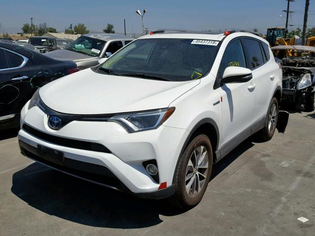 JTMRJREVXHD145757 - 2017 TOYOTA RAV4 HV LE WHITE photo 2