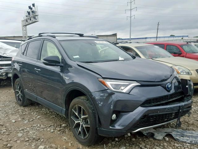 JTMJJREV5JD170200 - 2018 TOYOTA RAV4 HV SE GRAY photo 1