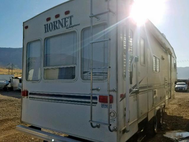 4YDF275224E310602 - 2004 KEYSTONE HORNET WHITE photo 4