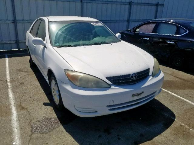 JTDBE32K720113764 - 2002 TOYOTA CAMRY LE WHITE photo 1