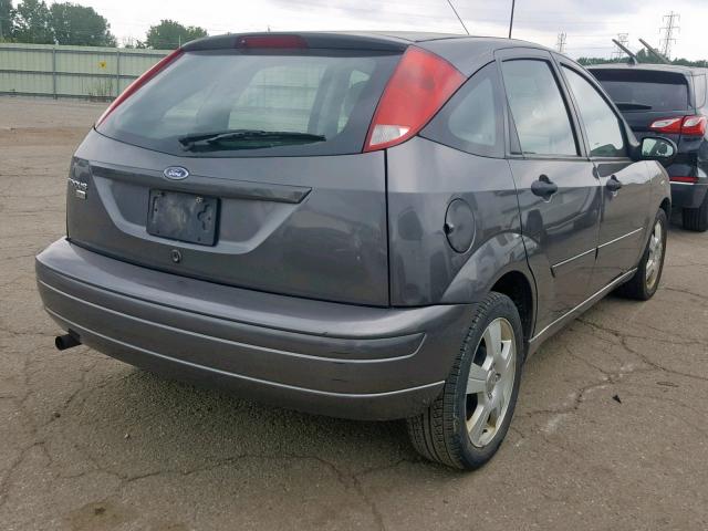 1FAHP37N97W340794 - 2007 FORD FOCUS ZX5 GRAY photo 4