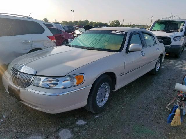 1LNHM85W31Y648823 - 2001 LINCOLN TOWN CAR C TAN photo 2