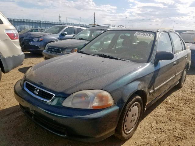 JHMEJ6520VS035213 - 1997 HONDA CIVIC DX GREEN photo 2