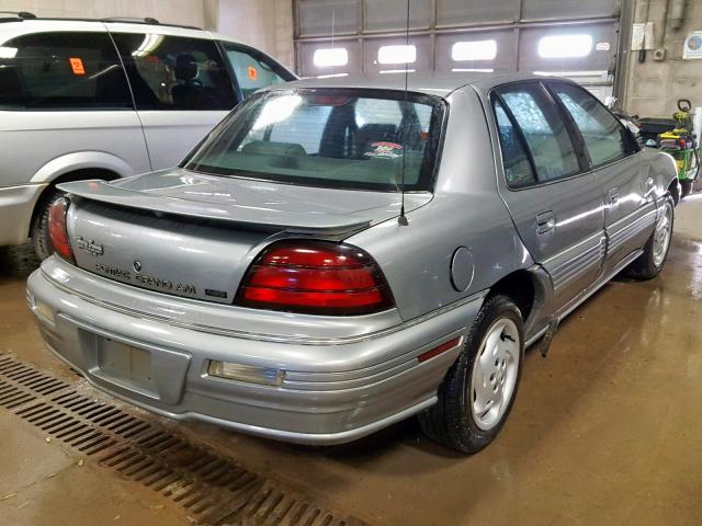 1G2NE55MXSC846769 - 1995 PONTIAC GRAND AM S GRAY photo 4