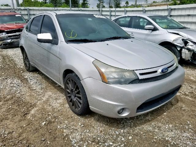 1FAHP3GNXAW159730 - 2010 FORD FOCUS SES SILVER photo 1