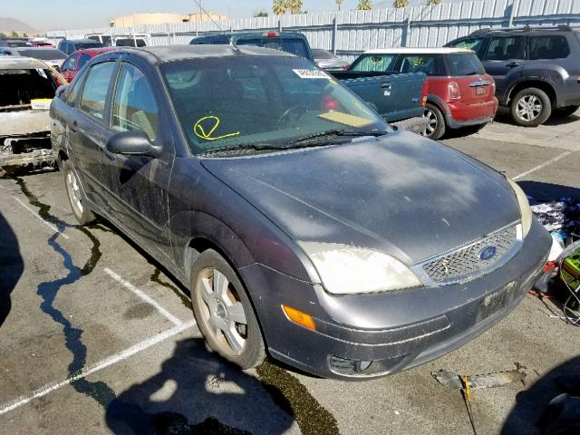 1FAFP34N05W138404 - 2005 FORD FOCUS ZX4 GRAY photo 1