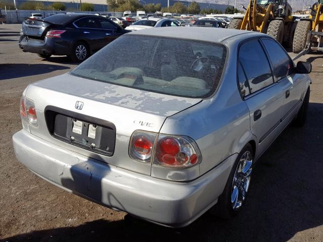 1HGEJ6620TL021207 - 1996 HONDA CIVIC DX SILVER photo 4