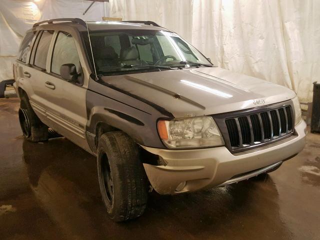 1J4GW58N74C215223 - 2004 JEEP GRAND CHER TAN photo 1