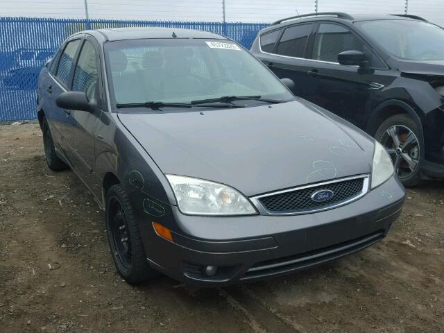 1FAFP34NX5W180904 - 2005 FORD FOCUS ZX4 GRAY photo 1