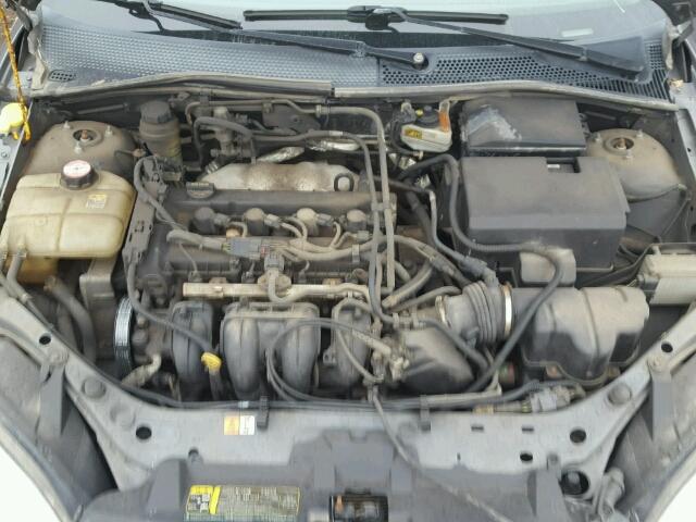 1FAFP34NX5W180904 - 2005 FORD FOCUS ZX4 GRAY photo 7