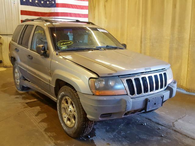 1J4GW48S61C597370 - 2001 JEEP GRAND CHER TAN photo 1