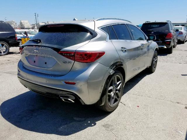 SJKCH5CP7JA054058 - 2018 INFINITI QX30 BASE SILVER photo 4