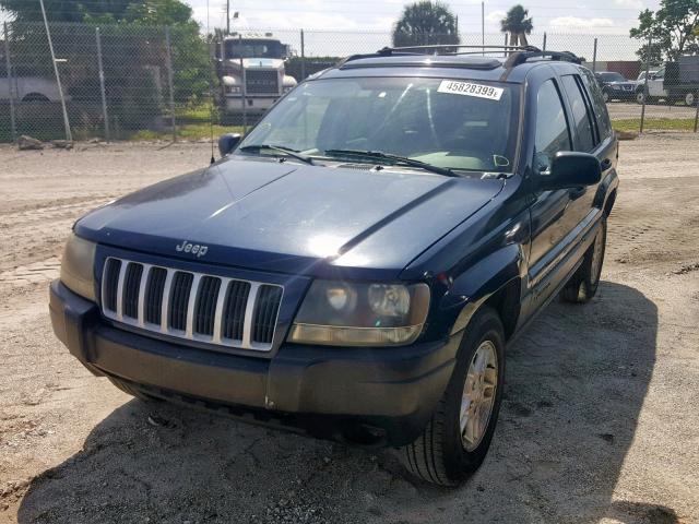 1J4GX48NX4C402060 - 2004 JEEP GRAND CHER BLUE photo 2