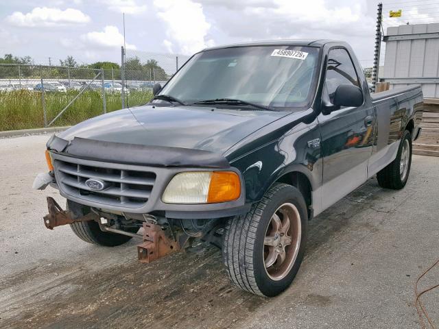 2FTRF17244CA49784 - 2004 FORD F-150 HERI GREEN photo 2