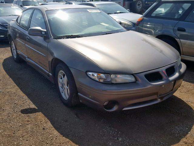 1G2WP52K11F202947 - 2001 PONTIAC GRAND PRIX GOLD photo 1