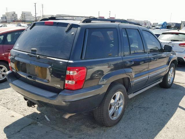 1J8GX68J04C157597 - 2004 JEEP GRAND CHER BLACK photo 4