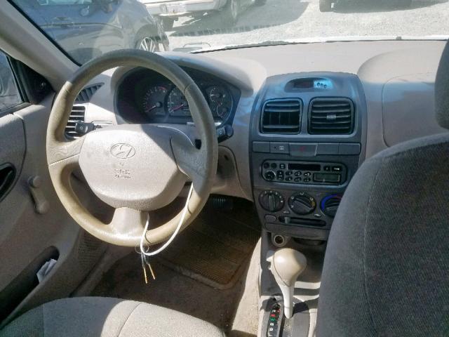 KMHCG35C61U082156 - 2001 HYUNDAI ACCENT GS WHITE photo 9