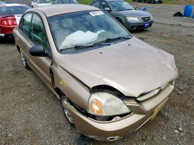 KNADC125746321668 - 2004 KIA RIO GOLD photo 1