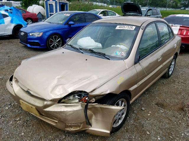 KNADC125746321668 - 2004 KIA RIO GOLD photo 2