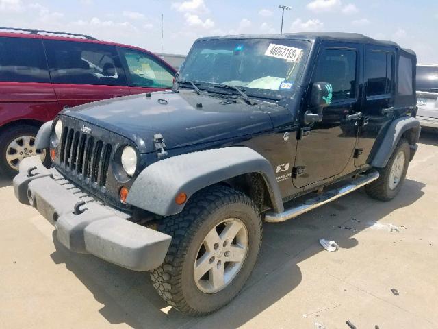 1J4GA39139L776055 - 2009 JEEP WRANGLER U BLACK photo 2