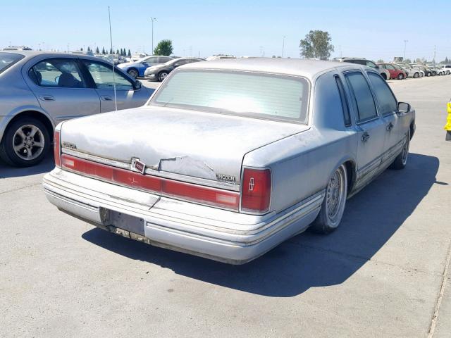 1LNCM83W2MY695908 - 1991 LINCOLN TOWN CAR C BLUE photo 4