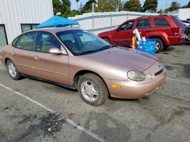 1FALP52UXVA106923 - 1997 FORD TAURUS GL GOLD photo 1