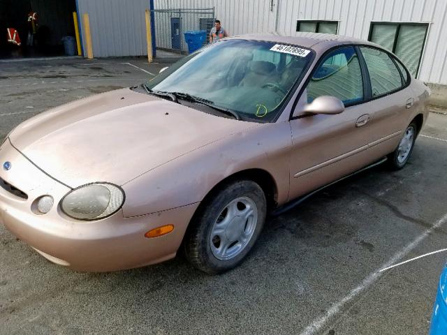 1FALP52UXVA106923 - 1997 FORD TAURUS GL GOLD photo 2