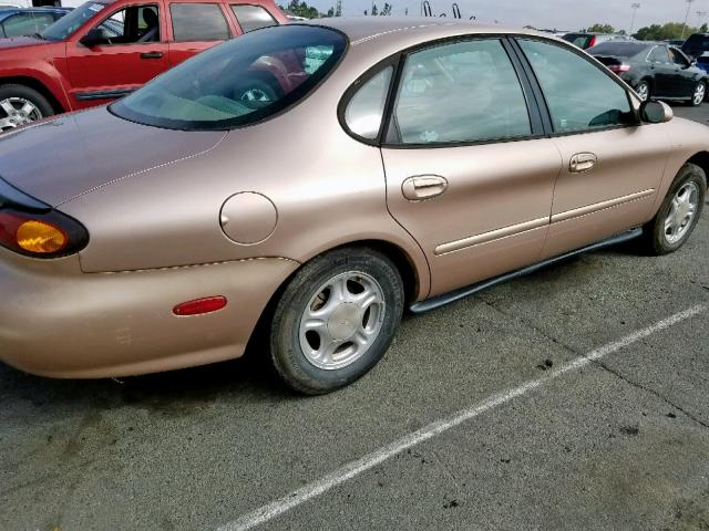 1FALP52UXVA106923 - 1997 FORD TAURUS GL GOLD photo 4