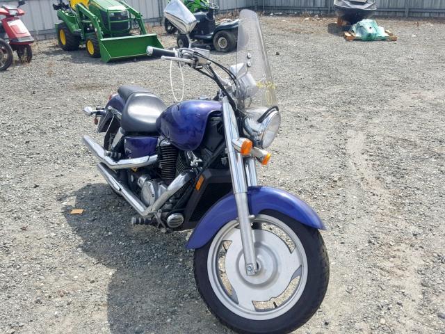 1HFSC43014A402716 - 2004 HONDA VT1100 C2 PURPLE photo 1