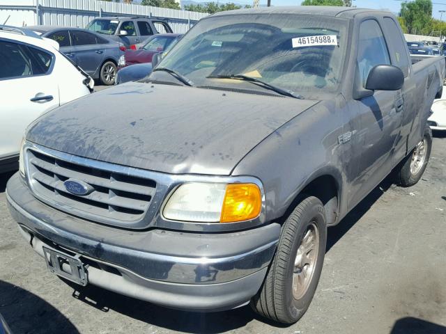 2FTRX17274CA07283 - 2004 FORD F-150 HERI GRAY photo 2