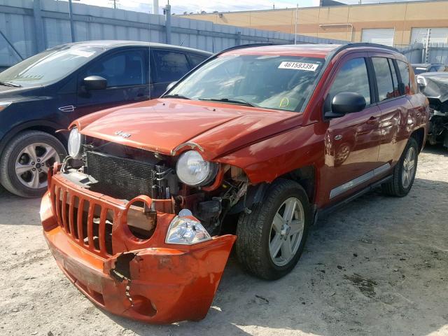 1J4NF4FB2AD622396 - 2010 JEEP COMPASS SP ORANGE photo 2