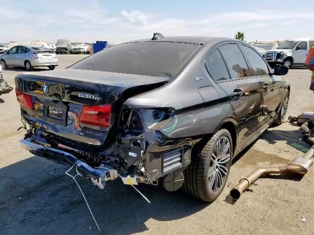 WBAJB1C50KB376648 - 2019 BMW 530XE BLACK photo 4