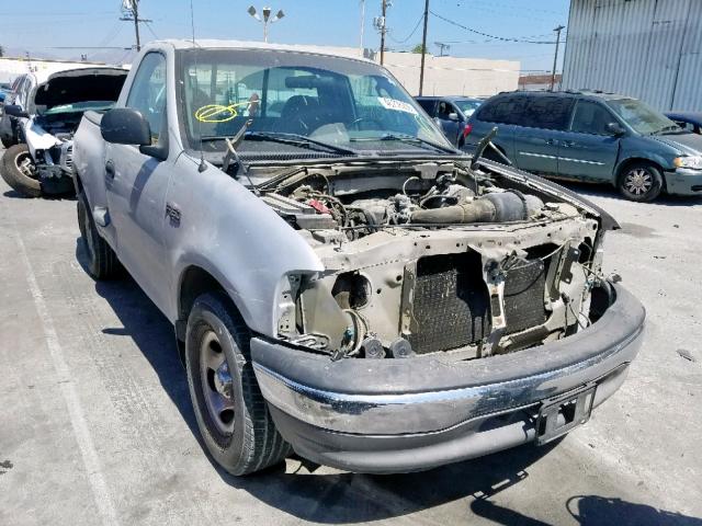 2FTRF072X4CA10319 - 2004 FORD F-150 HERI SILVER photo 1