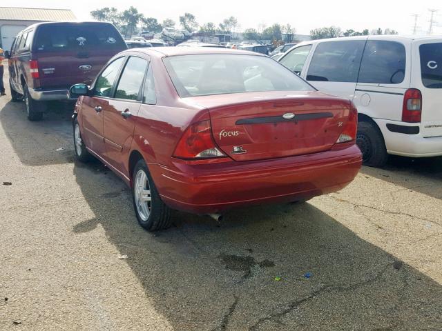 1FAFP34384W168067 - 2004 FORD FOCUS SE C RED photo 3