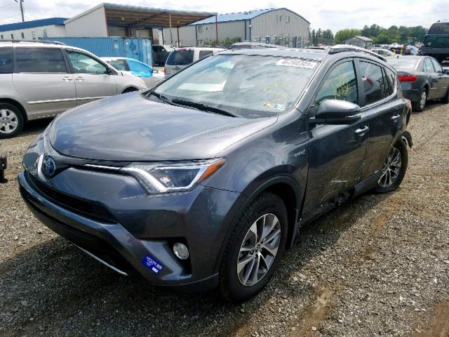 JTMRJREV4JD250428 - 2018 TOYOTA RAV4 HV LE GRAY photo 2