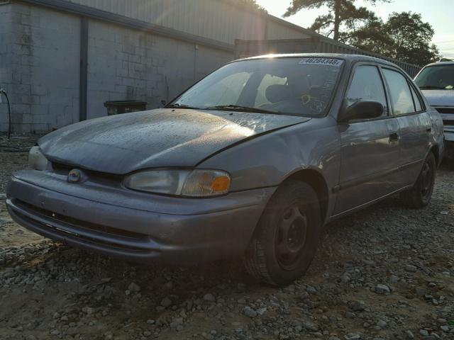 1Y1SK5289WZ419354 - 1998 CHEVROLET GEO PRIZM GRAY photo 2