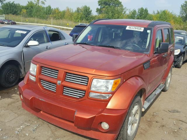 1D8GU58677W620104 - 2007 DODGE NITRO R/T ORANGE photo 2