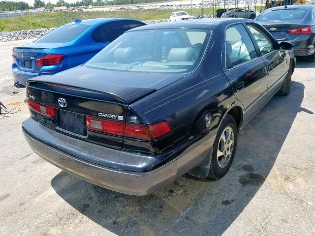 4T1BG22KXXU607357 - 1999 TOYOTA CAMRY CE BLACK photo 4