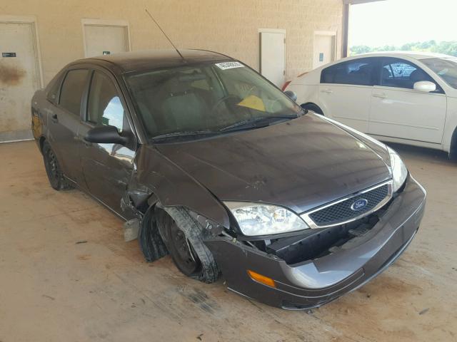 1FAHP34NX7W166139 - 2007 FORD FOCUS ZX4 GRAY photo 1