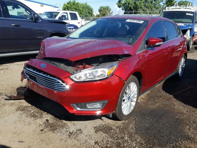 1FADP3N24HL268509 - 2017 FORD FOCUS TITA RED photo 2