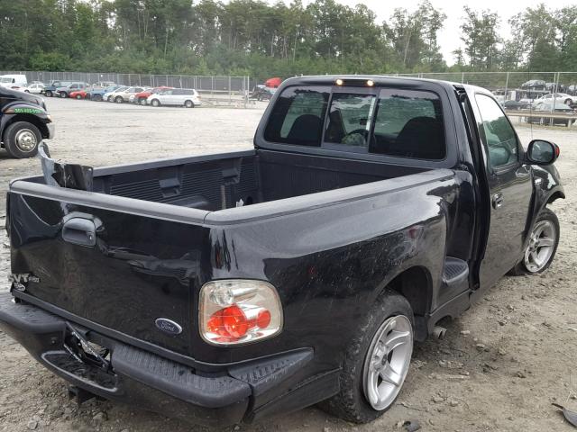 2FTZF07362CA30072 - 2002 FORD F150 SVT L BLACK photo 4