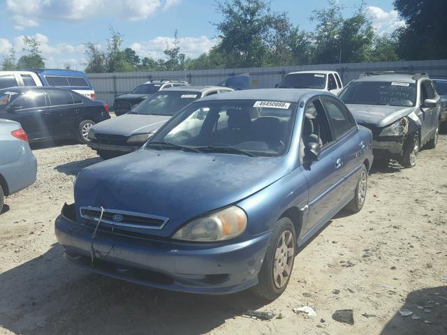 KNADC123726159181 - 2002 KIA RIO BLUE photo 2