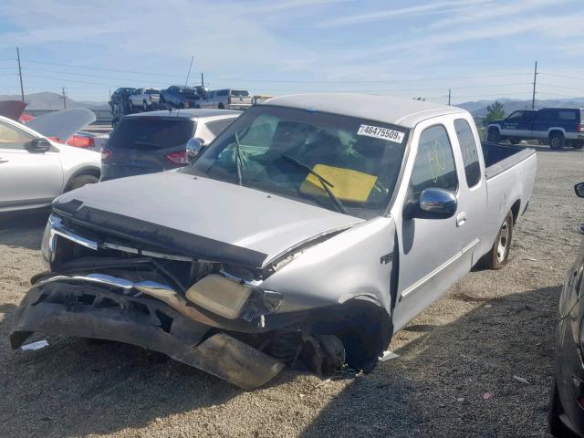1FTZX17221NB58876 - 2001 FORD F150 GOLD photo 2